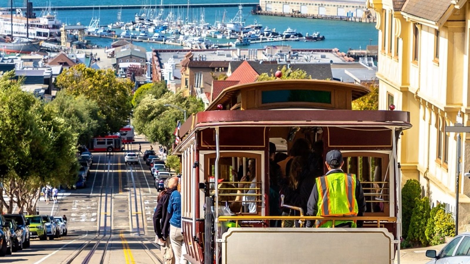 The Cable car tram and Alcatraz prison island on a background in San Francisco, California, USA